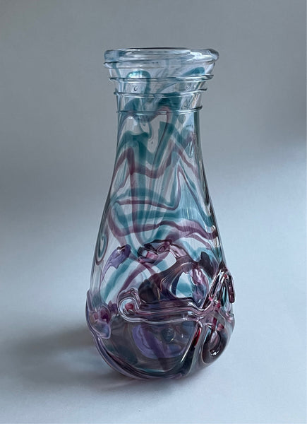 steel blue/indigo on crossover pulls of blue chalcedony inside cerise/royal purple with lip spiral vase